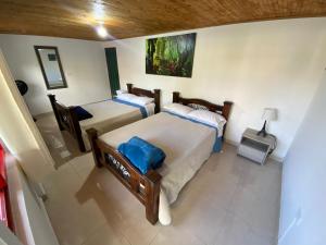 Giường trong phòng chung tại Chalet Alto Bonito +31 ảnh