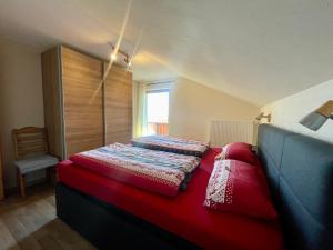 מיטה או מיטות בחדר ב-Im- Oberland - Berg - KönigsCard