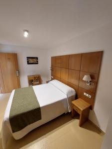 Postel nebo postele na pokoji v ubytování Hotel Tio Pepe