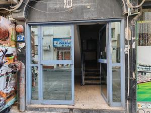 an entrance to a building with a glass door at Qamar home rental Deira in Dubai