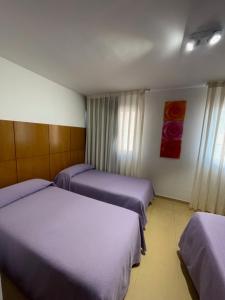 Postel nebo postele na pokoji v ubytování Hotel Tio Pepe