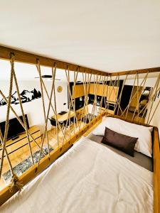 a bedroom with a bed on a boat at H11 - Evergreen Tale in Bystrá