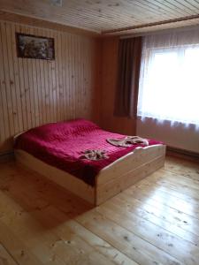 Postel nebo postele na pokoji v ubytování Смерека