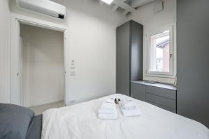 Ліжко або ліжка в номері Loft Design Free Parking - Maranello - Sassuolo