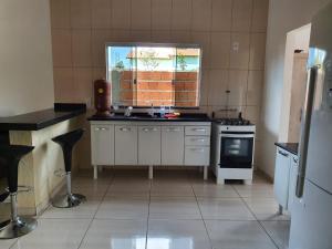 A cozinha ou cozinha compacta de Casa - ALTO PARAISO DE GOIAS