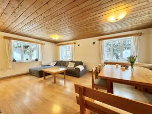 a living room with a couch and a table at Chalupa Hraběnka in Jablonec nad Nisou