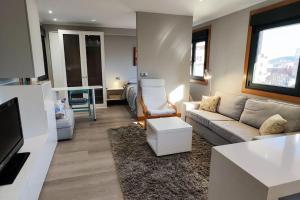 Χώρος καθιστικού στο Joaquin Lóriga diseño centro Vigo +9 φωτογραφίες