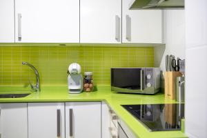A kitchen or kitchenette at Apartamento Cerca de la playa