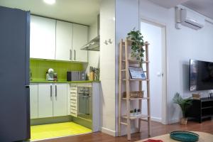 A kitchen or kitchenette at Apartamento Cerca de la playa