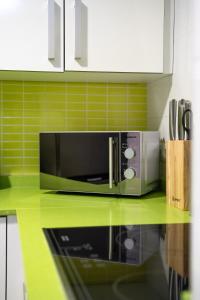 A kitchen or kitchenette at Apartamento Cerca de la playa
