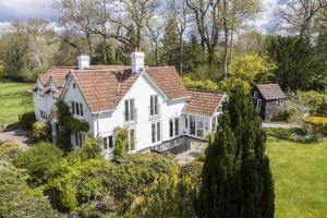 an aerial view of a white house at Broombank in Burley