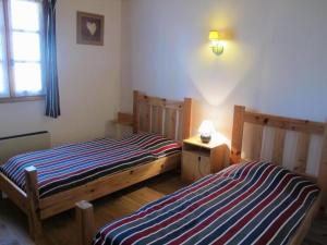 Ένα ή περισσότερα κρεβάτια σε δωμάτιο στο Domaine Le Mayne - Le Châtaignier - Clévacances 2 Clés