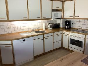 Kuchyň nebo kuchyňský kout v ubytování NEU! Ferienhaus Zur Oste + 20 fotografií