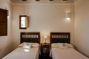 Posteľ alebo postele v izbe v ubytovaní Can Noves - Villa de 5 suites 28 y 58