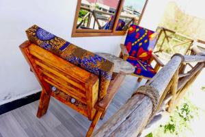 Двухъярусная кровать или двухъярусные кровати в номере Asili Nyumbani Residence
