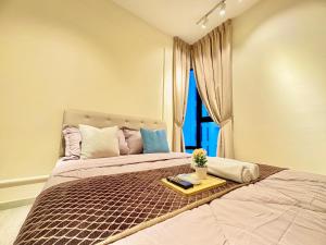 Katil atau katil-katil dalam bilik di Mosaic Southkey Mid Valley by Luxecocoo CK Johor Bahru