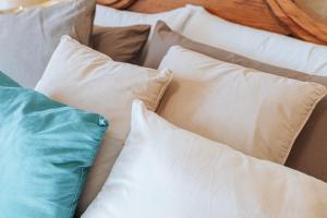 Ένα ή περισσότερα κρεβάτια σε δωμάτιο στο Amaryllis Holiday Home