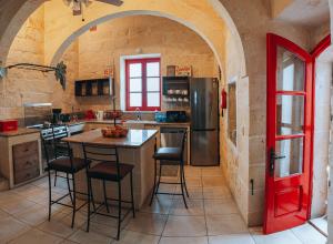 Η κουζίνα ή μικρή κουζίνα στο Amaryllis Holiday Home