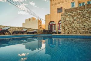 Πισίνα στο ή κοντά στο Amaryllis Holiday Home