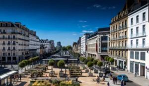 a city street with buildings and people walking on the street at Yukos-Studio Cosy-(Hypercentre) in Rennes