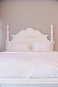 Postel nebo postele na pokoji v ubytování The Karaoke Homes Ipoh, Tambun Sunway