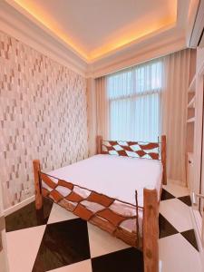 Voodi või voodid majutusasutuse Spring loft condo toas