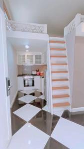 Köök või kööginurk majutusasutuses Spring loft condo +4 fotot