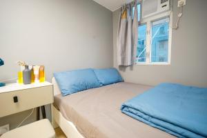Postel nebo postele na pokoji v ubytování Student Accommodation - 292 Hennessy Road