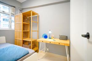 Postel nebo postele na pokoji v ubytování Student Accommodation - 292 Hennessy Road