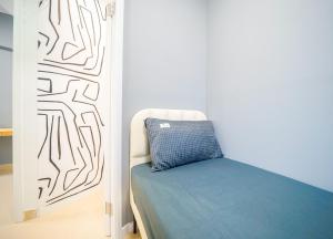 Postel nebo postele na pokoji v ubytování Student Accommodation - 292 Hennessy Road