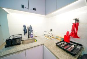 Kuchyň nebo kuchyňský kout v ubytování Student Accommodation - 292 Hennessy Road