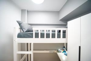 Postel nebo postele na pokoji v ubytování Student Accommodation - 292 Hennessy Road