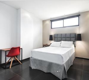 Hotel Cartagena DC客房内的一张或多张床位