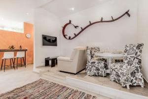 Svetainės erdvė apgyvendinimo įstaigoje La Rosa Dei Papi