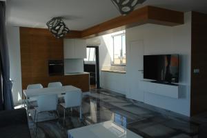 A kitchen or kitchenette at Botabara Del Mar Boutique