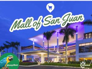 a mall of san francisco with a parrot in front of it at Cozy Vacation Home -San Juan -Centric location in San Juan