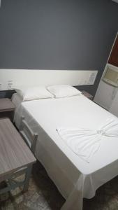 Voodi või voodid majutusasutuse POUSADA TAHITI toas