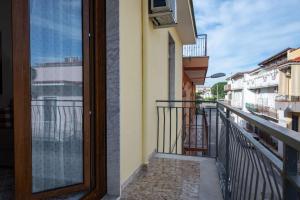 a balcony with a view of a city at Classy House in Marigliano in Marigliano