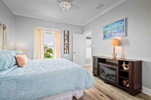 Postel nebo postele na pokoji v ubytování 050 Lifes A Beach