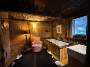 A bathroom at Warm and Stylish Boutique Lodge L'Etoile de Savoie