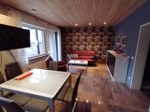 TV a/nebo společenská místnost v ubytování Ferienwohnung Rhede No 1 im EG