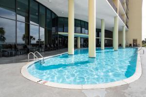 a large swimming pool in the middle of a building at 507 Holiday Isle 507 in Dauphin Island