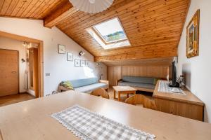 Kuchyň nebo kuchyňský kout v ubytování Appartamenti Cesa Maria Mountain Hospitality