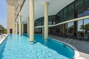 a swimming pool in the middle of a building at 320 Holiday Isle in Dauphin Island