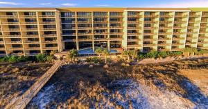 an aerial view of a large apartment building at 520 Holiday Isle 520 in Dauphin Island