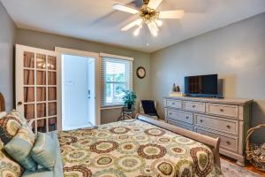 a bedroom with a bed and a ceiling fan at Lincolnton Vacation Rental with Deck and Yard! in Lincolnton