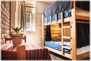 Postel nebo postele na pokoji v ubytování ATMA Hostel & Yoga