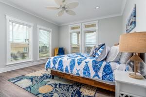 En eller flere senge i et værelse på 079 Family Tides