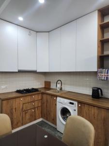 Kuhinja oz. manjša kuhinja v nastanitvi Apartments on Kuchisvili - Welcome Inn