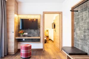 TV a/nebo společenská místnost v ubytování Hotel Alte Post